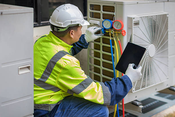 Professional Ductwork Repair technician working in Portage, MI